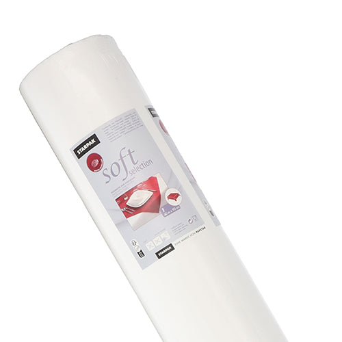 Eine Rolle weißer Starpak-Tischdecke, stoffähnlich, Vlies „Soft Selection“ (40 m x 0,9 m) wird aufrecht in ihrer Schachtel abgebildet, mit Produktdetails und einem Bild eines gemachten Bettes auf der Verpackung vor einem weißen Hintergrund.