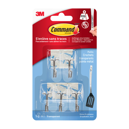 Eine Packung 3M Deutschland GmbH Command™ Drahthaken, klein, transparent, mit transparenten Streifen fasst bis zu 225 g und enthält fünf Haken und sechs Klebestreifen. Die Verpackung ist blau mit Angaben auf Französisch und Englisch.