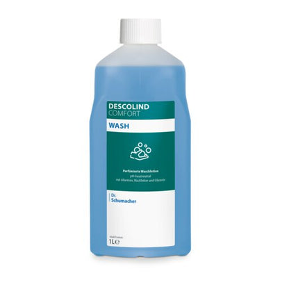 The 1-liter bottle of Dr. Schumacher Waschlotion DESCOLIND COMFORT WASH by Dr. Schumacher GmbH with a white cap and blue liquid highlights the pH skin-neutral formula and allantoin on the white-green front label next to the product information.
