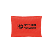 Erste Hilfe Mit dem Rucksack unterwegs orange