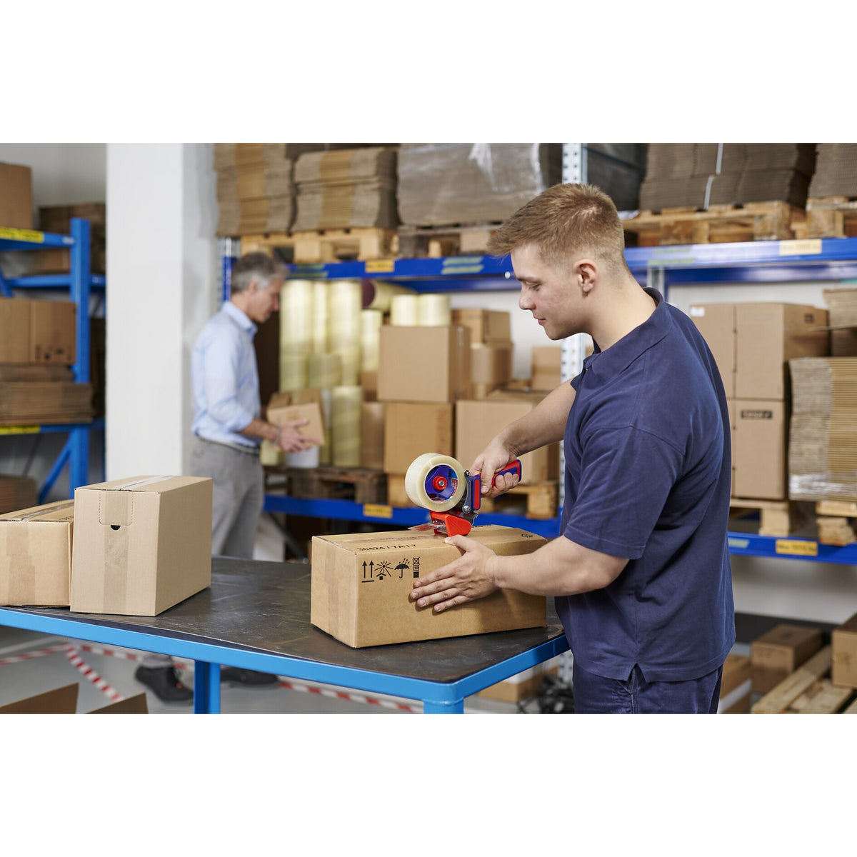 tesa 6500 Packaging Tape Hand Dispenser (Low-Noise) for 50 mm Wide Rolls – Application