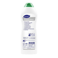 Eine weiße 0,5-Liter-Flasche Diversey R7 Creme-Reiniger für harte, wasserfeste Oberflächen von Diversey Deutschland GmbH & Co. OHG mit grünem Verschluss und mehrsprachigem Etikett mit Anweisungen, Produktname, Barcode und Recycling-Symbolen.