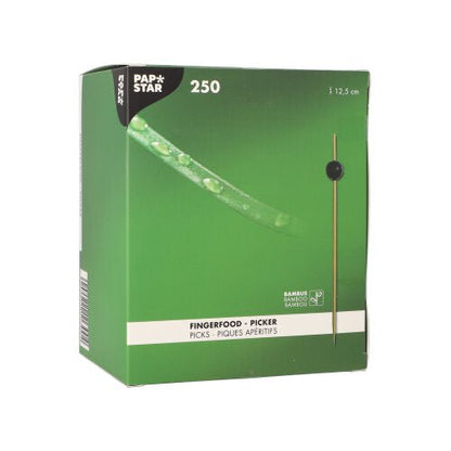 A green box containing 250 finger food picks from the PAPSTAR GmbH, each 12.5 cm long; the front features a single biodegradable skewer and product information in several languages.
