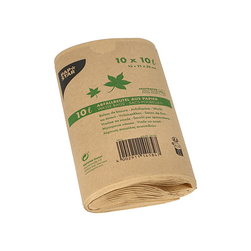 A rolled 10-piece set PAPSTAR kraft paper waste bags (10 l, 35x21x15 cm, brown) from PAPSTAR GmbH is provided with a banderole with green lettering and leaf symbols and labeled as environmentally friendly - ideal for organic waste.