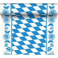 The Dunicel "Tête-à-Tête" table runner (24 m x 0.4 m, 20 sections) from Duni GmbH features a blue-and-white diamond pattern with floral borders and a rolled edge for an elegant table setting.