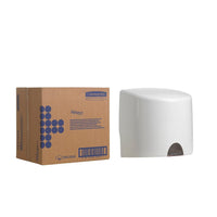 A cardboard box labeled "Kimberly-Clark GmbH" stands next to a white Aquarius™ wipe dispenser—central dispensing, ideal for hygienic wipe retrieval—against a plain white background.