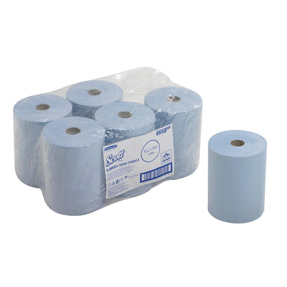 Pictured is a plastic-wrapped pack of six blue Scott® Slimroll™ towels from Kimberly-Clark GmbH, with an additional roll on the right side. The label contains product information about this space-saving towel solution.