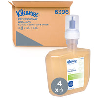 A box from Kimberly-Clark GmbH labeled "Kleenex® Botanics™ Luxury Foam Hand Wash - 1.2L Cassette / 4 Electronic Cassettes" is displayed next to a 1.2L refill pack; both feature the Kleenex® logo and product information.
