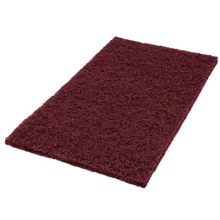 The Twister Pad purple, square from Diversey Deutschland GmbH & Co. OHG is ideal for the maintenance cleaning of coated hard floors and has a chestnut brown, textured surface. Here depicted on a white background.