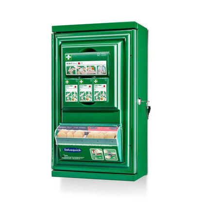 The green Cederroth First Aid Cabinet Mini (Metal) by Orkla Wound Care AB (W 260 x H 440 x D 170 mm) features storage compartments, illustrated instructions, a transparent Salvequick bandage panel, and a key lock on the right side.