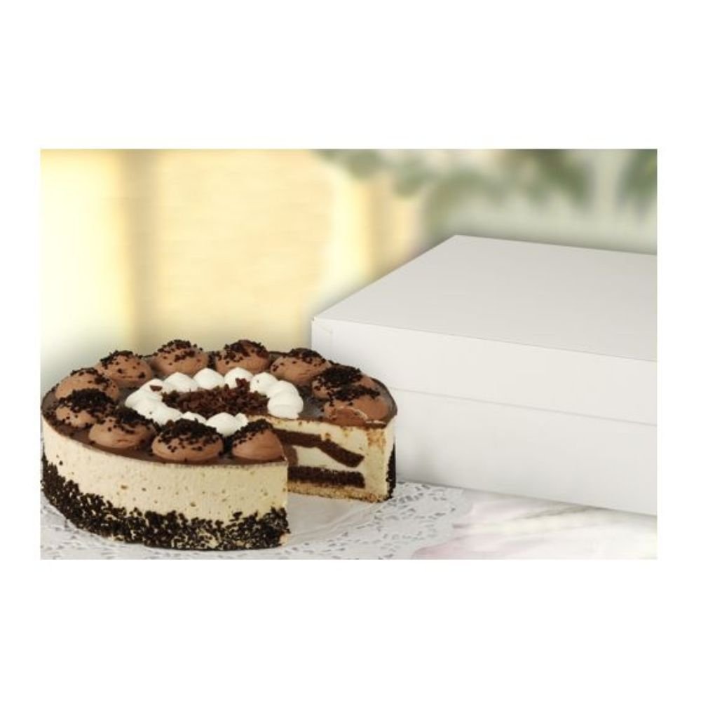 A chocolate-cream cake with swirled frosting sits next to a sealed PAPSTAR GmbH 30x30x13 cm square white cake box (10 pieces, with lid); one slice has been removed.