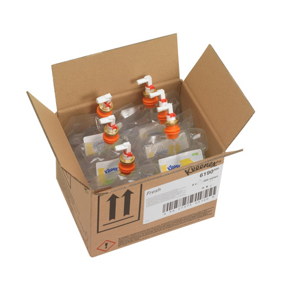 An open box labeled Kleenex® Scented Air Freshener Fresh Refill Pack 6190 by Kimberly-Clark GmbH contains six transparent refill bottles with white and orange spouts; the box features barcodes, floral scents, and handling symbols.