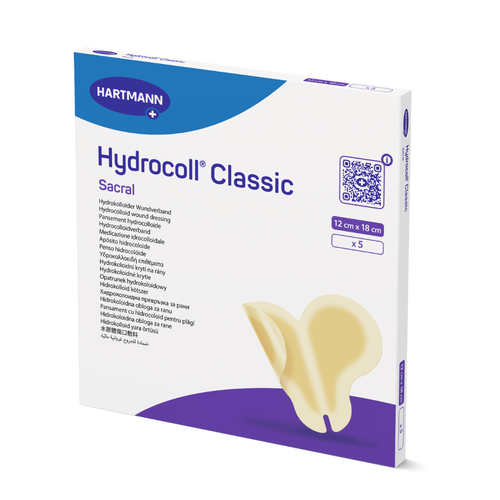 Eine Packung Hartmann Hydrocoll Classic Sacral steril einzeln eingesiegelt 12 x 18 cm der Paul Hartmann AG enthält 5 Wundauflagen zur feuchten Wundbehandlung. Die Packung enthält Produktdetails und eine Verbandabbildung.