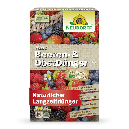 On a box of Neudorff Shop Azet Berry & Fruit Fertilizer, an organic fertilizer for strawberries and berry bushes, various berries are depicted, and the packaging advertises the natural and long-lasting benefits.