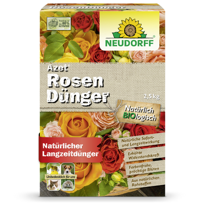 Eine 2,5 kg Kiste Azet RosenDünger aus dem Neudorff Shop, mit Abbildungen blühender Rosen und einem Text, der ihn als natürlichen, organischen Langzeit-Rosendünger für prächtige Rosen beschreibt.