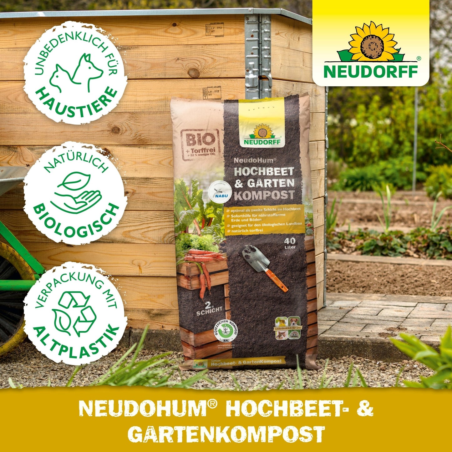 A bag of NeudoHum Raised Bed & Garden Compost from the Neudorff Shop lies in front of a wooden raised bed - perfect as a planting substrate or soil layer. Icons show that it is animal-friendly, natural, organic, and packaged in bioplastic.