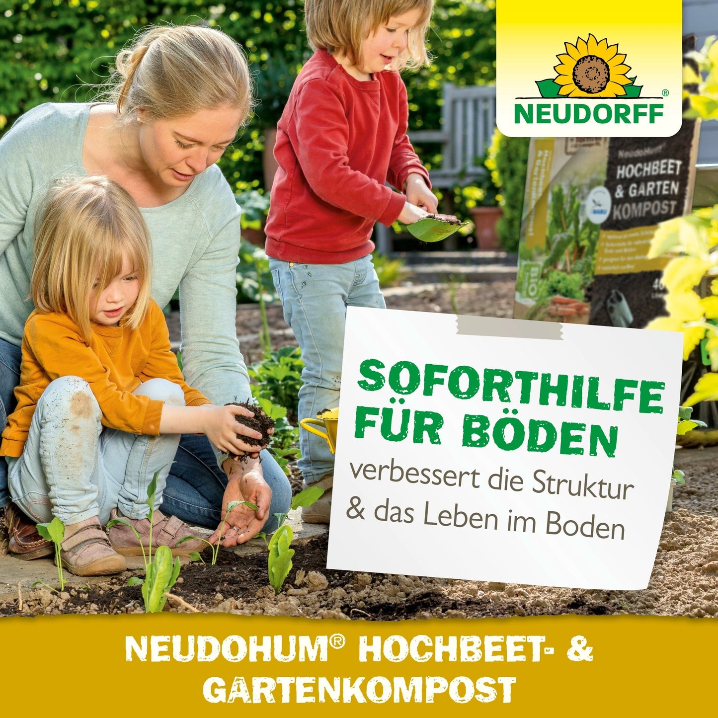 A woman and two children are gardening in a raised bed with NeudoHum Raised Bed & Garden Compost from the Neudorff Shop. The woman is planting a seedling while one child helps and another watches. The image shows advertising text and Neudorff branding.