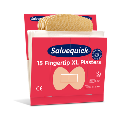 Eine Packung Orkla Wound Care AB XL Fingertip Textilpflaster (15 Stück/Mine | Packung, 6 Stück) mit flexiblen beigen Pflastern in einer rot-weißen Schachtel, jedes Pflaster 87 x 56 mm groß.