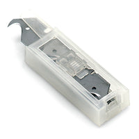 A close-up of the Nölle Profi Brush Dispenser with 10 replacement blades (hook-shaped) from Nölle Profi Brush Bürsten- & Pinseltechnik e.K., showing one of the replacement blades inside the transparent plastic container.