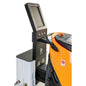 A touchscreen control panel stands next to an orange-gray TASKI GS Ecobot 50P with a hose, a "No Smoking" sticker, and the TASKI GS Service Station 50 from Diversey for combined charging of electricity and water. (1 package).