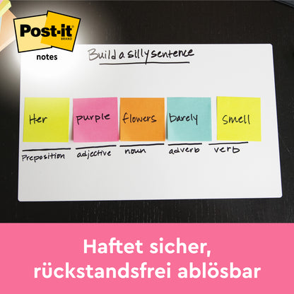 Ein Whiteboard zeigt fünf neonfarbene Post-it® Z-Notes (76x76mm, 100 Blatt, 6 Blöcke, 100% PEFC) der 3M Deutschland GmbH, beschriftet mit Wörtern und grammatikalischen Rollen; das Post-it-Logo erscheint oben links und der deutsche Text unten auf rosa.