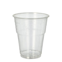 A PAPSTAR 25 cold drink cups, PLA “pure,” crystal-clear with a foam rim from PAPSTAR A GmbH logo made of biodegradable plastic stands upright against a plain white background.