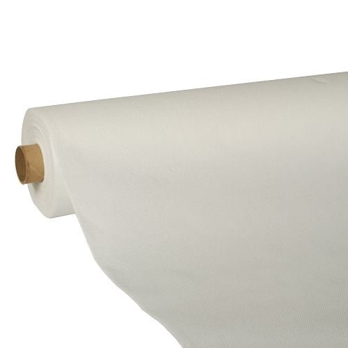A large tablecloth from the PAPSTAR GmbH, "ROYAL Collection" tissue paper, is partially unrolled, revealing the smooth, high-quality white tissue material with a cardboard core. The tablecloth has a simple, patternless appearance.