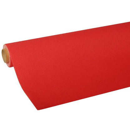A partially unrolled PAPSTAR-Tablecloth from the ROYAL collection of the PAPSTAR GmbH features smooth, sturdy, high-quality red tissue paper, neatly wrapped around a cardboard tube.