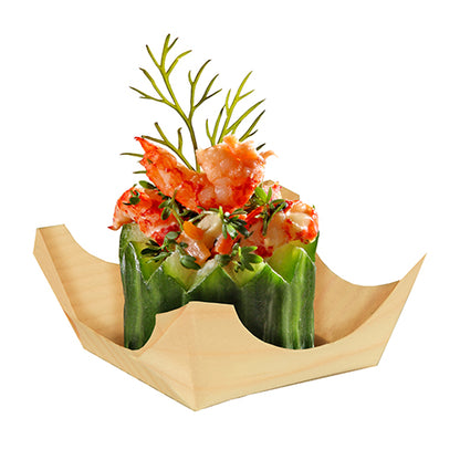 A PAPSTAR 50 finger food bowl, wood "pure" round from PAPSTAR GmbH holds a cucumber bowl with chopped lobster, garnished with dill and herbs. Its elegant appearance forms a nice contrast to the simple white background.