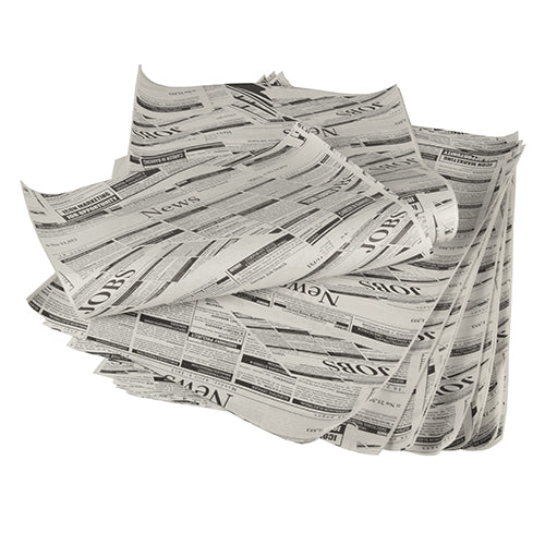 A stack of PAPSTAR wrapping papers, parchment substitute 35 cm x 25 cm greaseproof from PAPSTAR GmbH, messily arranged with “NEWS” and “JOBS” in black on white sheets.