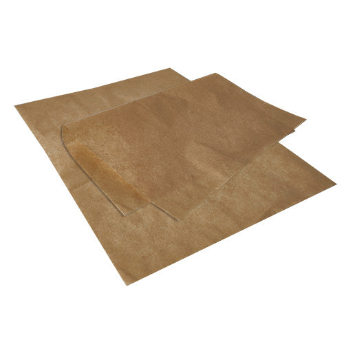 Two overlapping PAPSTAR wrapping papers, parchment substitute 35 cm x 25 cm greaseproof from PAPSTAR GmbH, lie on a white background. The wavy corner of a sheet emphasizes its thin, semi-transparent, greaseproof texture.