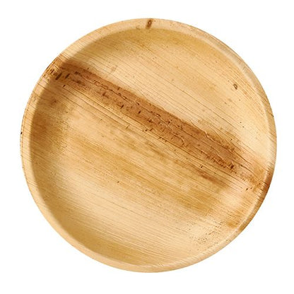 The PAPSTAR plate made of palm leaf "pure", round Ø 23 cm, consists of untreated palm leaf with individual grain patterns - biodegradable, environmentally friendly and ideal as a disposable plate | Box with 25 pieces.