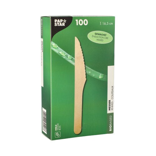 Abgebildet ist eine grüne Schachtel PAPSTAR Holzmesser "pure" (16,5 cm, gewachst, 100 Stück) der PAPSTAR GmbH; sie enthält umweltfreundliche Einwegmesser - ideal als nachhaltiges Besteck für den umweltbewussten Einsatz.