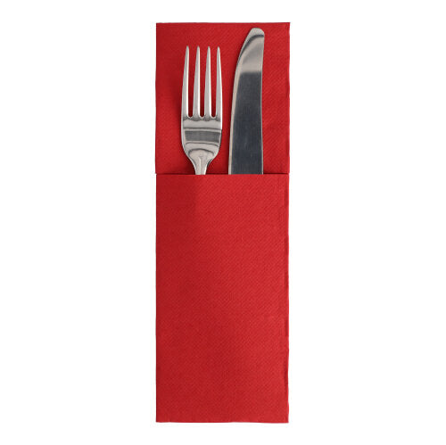 Silver fork and knife lie in a red napkin pocket folded in the classic cutlery fold style on a white background – an elegant addition to the ROYAL Collection "50 Napkins" (48 x 30 cm) with cutlery fold by PAPSTAR GmbH.