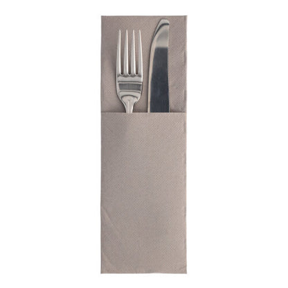 A silver fork and a silver knife lie side by side in a brown PAPSTAR 50 napkins "ROYAL Collection" 48 cm x 30 cm with cutlery fold napkin by PAPSTAR GmbH, presented on a plain white background.