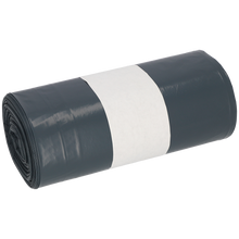 Eine aufgerollte EMIL DEISS KG (GmbH + Co.) DEISS 94118 Folienrolle in grau (500+400x1200x0,05 mm, 20 Stück), mit einem einfarbig weißen Papierband in der Mitte, steht auf weißem Untergrund.