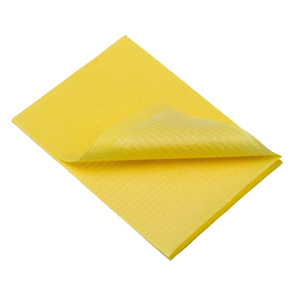 A folded yellow cleaning cloth, similar to the AMPri Dental disposable patient napkins from AMPri Handelsgesellschaft mbH, lies on a white background. Its textured surface and soft, absorbent material suggest versatility for various cleaning tasks.