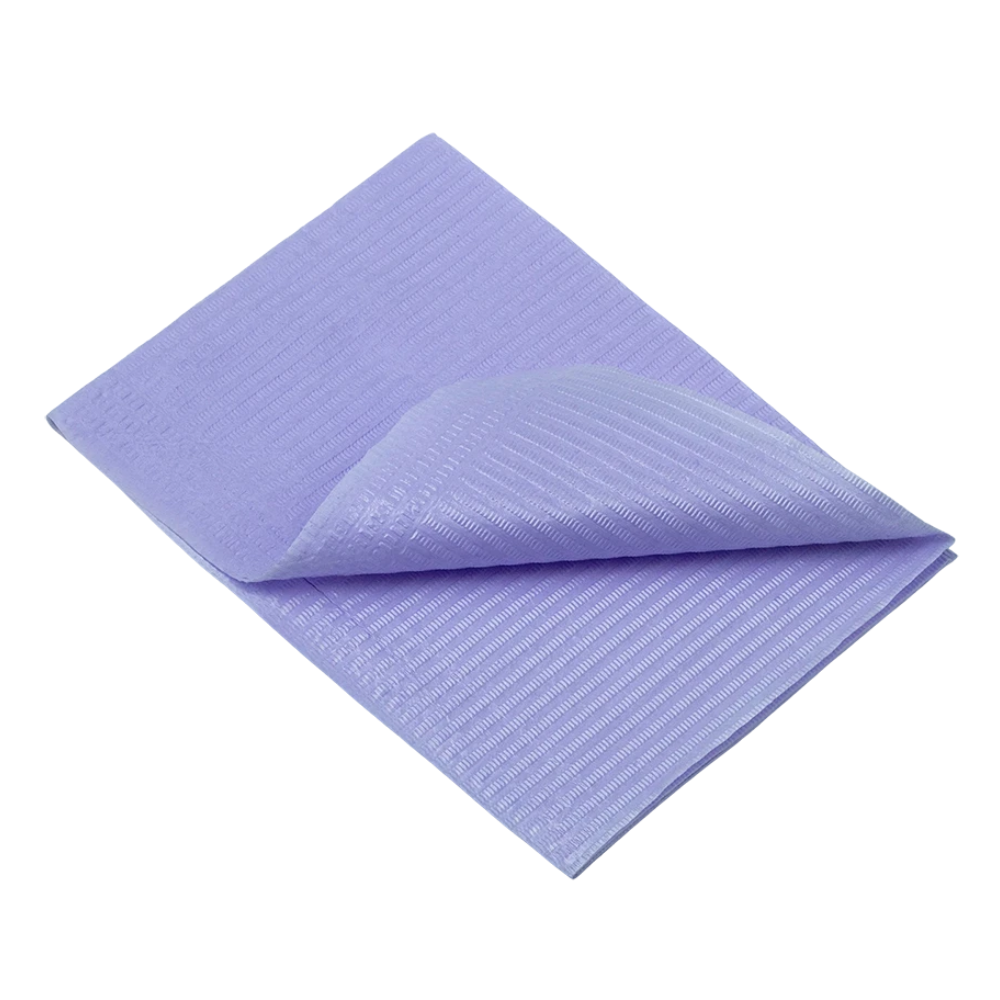 A folded piece of textured, light purple fabric resembles AMPri Dental disposable patient napkins from AMPri Handelsgesellschaft mbH and lies neatly on a flat surface. With its subtle stripe pattern and soft material, the top corner is slightly raised, revealing the underside.