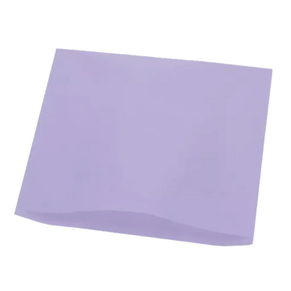 A square, flat sheet of light purple AMPri Dental headrest cover tissue polyethylene paper by AMPri Handelsgesellschaft mbH is placed on a plain white background.