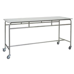 The Novocal work and storage table features a white solid-core countertop, a sturdy stainless steel frame, and four swivel casters for flexible use. Open base with no shelves—ideal as a work table in the office.
