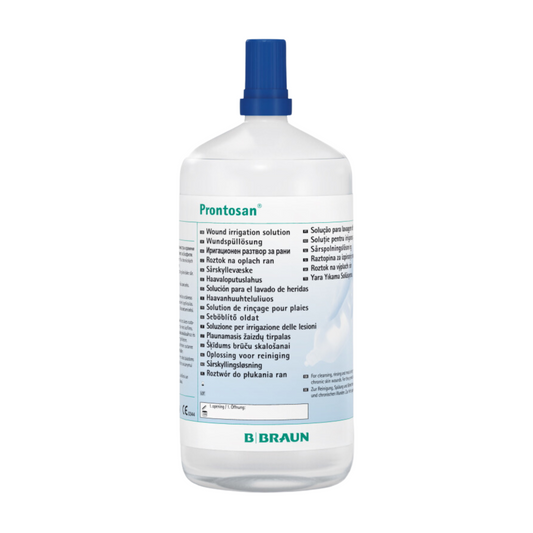 Eine Flasche B. Braun Prontosan® Wundspüllösung von B. Braun Melsungen AG mit mehrsprachiger Produktinformation auf einem weißen Etikett und einem blauen Verschluss.