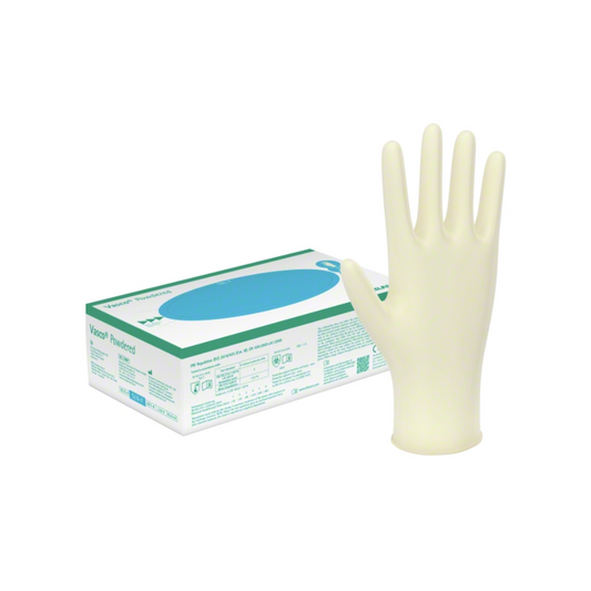Ein einzelner B. Braun Vasco® Powdered-Handschuh steht aufrecht neben seiner Schachtel, die als puderfrei gekennzeichnet ist und verschiedene Zertifizierungen auflistet. Die Verpackung ist hauptsächlich weiß und grün.