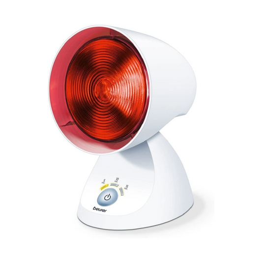 Eine Infrarotlampe IL 35 der Beurer GmbH auf weißem Hintergrund. Die Lampe hat einen modernen weißen Sockel mit Bedienknopf und einen neigbaren Kopf mit großem roten Licht.
