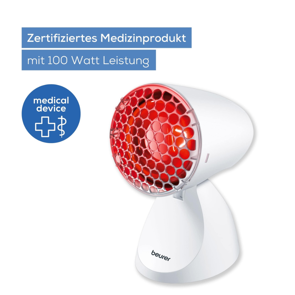 Ein Medizinprodukt der Beurer Infrarotlampe IL 11 der Beurer GmbH mit 100 Watt Leistung, einem weiß-roten Lampenkopf auf stabilem Standfuß und einem Symbol als zertifiziertes Medizinprodukt.