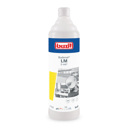 A 1-liter bottle of Buzil Budenat® LM D 447, a material-friendly disinfectant for sensitive surfaces. The label features the BUZIL-WERK Wagner GmbH & Co. KG brand logo in red and white with images depicting cleaning scenarios. The predominantly white bottle is designed with elements in blue and yellow.