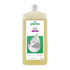 A 1-liter bottle of Buzil Rinax® Soap P 961, manufactured by BUZIL-WERK Wagner GmbH & Co. KG, features a teardrop-shaped label design depicting a person washing their hands under a faucet. The green logo and the symbols for environmental benefits and pH balance are clearly visible on the label, highlighting the product’s function as an eco-friendly, skin-friendly, and environmentally conscious hand wash.