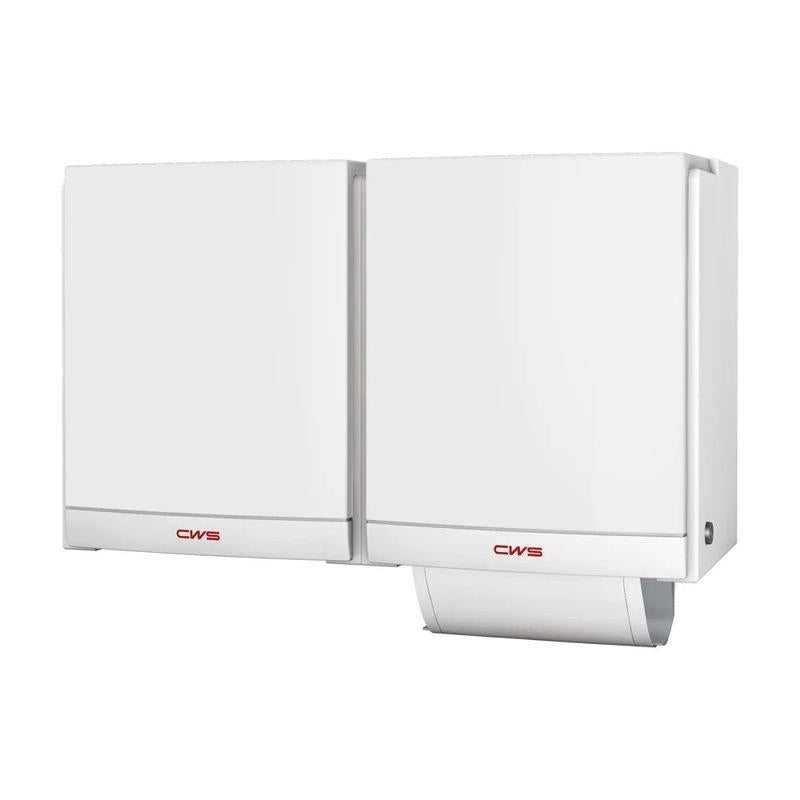 Two white CWS front panels for the DUO cloth towel dispenser from CWS are mounted side by side. The dispenser on the right has a partially pulled-out paper towel; both feature the red CWS logo, highlighting their hygienic design.