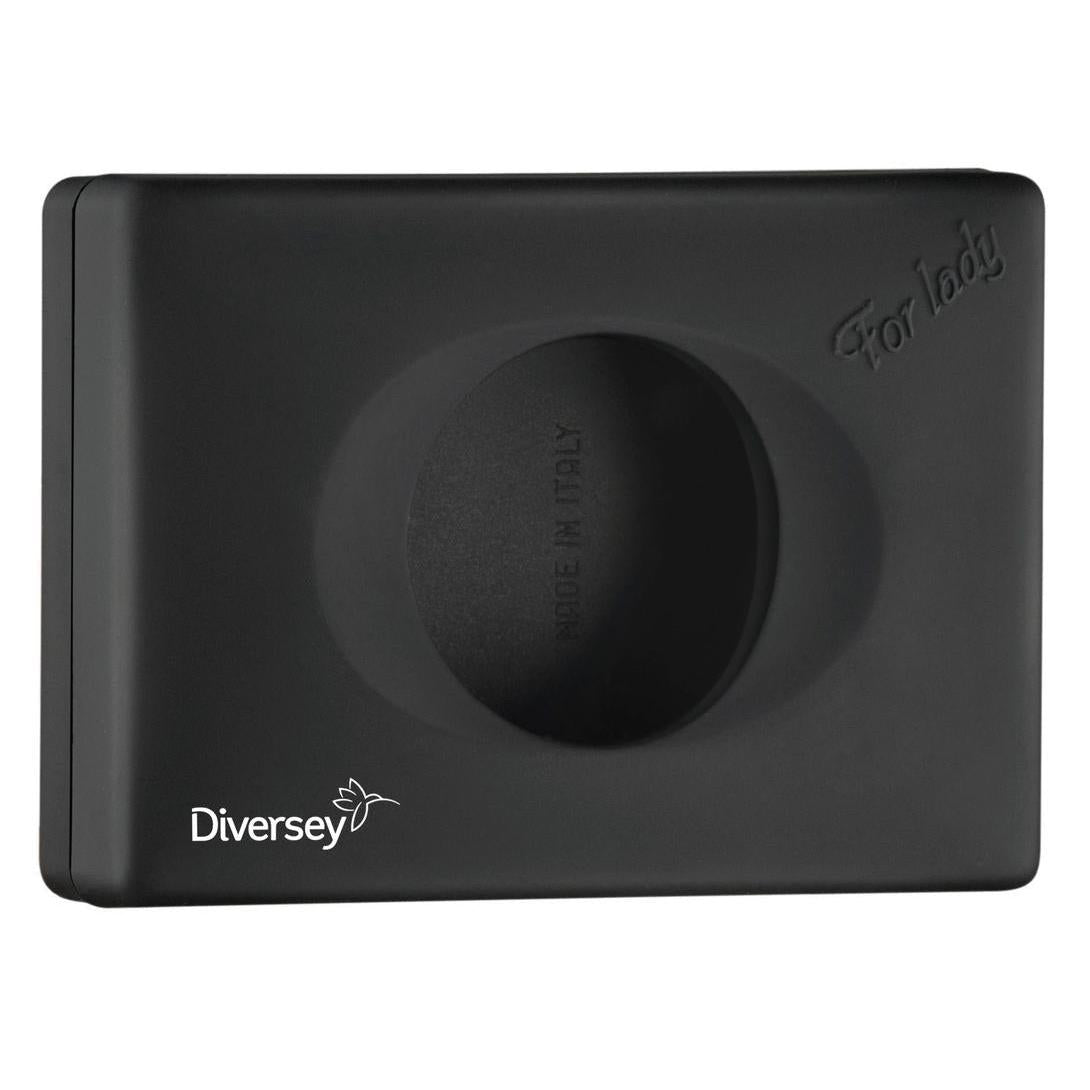 The Diversey Germany hygiene bag dispenser made of black plastic has a rectangular shape, an oval opening in the middle, "For lady" embossing at the top right, and a white logo at the bottom left. "Made in Italy" inside - perfect for hygiene products in the bathroom.