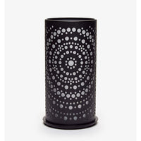 A black cylindrical vase with circular perforations arranged in concentric circles, creating a symmetrical design reminiscent of modern design—similar to the Duni Billy Metal Candle Holder by Duni GmbH—stands against a plain white background.