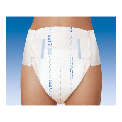 A person wearing Hartmann MoliCare® Premium Elastic, 6 drops - size S-XL by Paul Hartmann AG is standing in front of a gradient background. Only the lower upper body is visible. The diaper, designed for urinary and fecal incontinence, has adjustable side tabs and blue pattern markings.